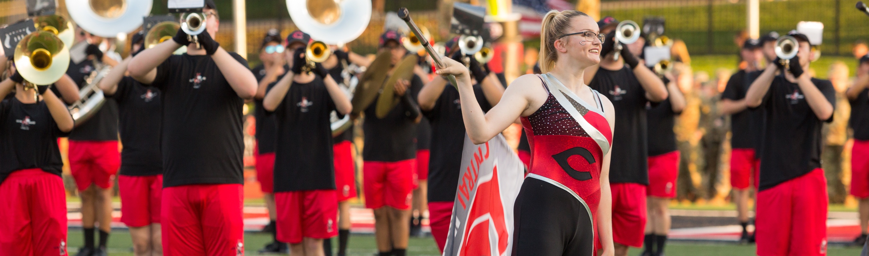 UCM Color Guard Member performing with UCM Marching Band.