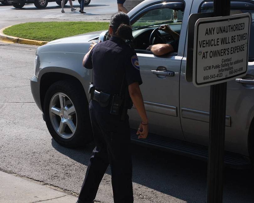 Officer Angee Garrett directs traffic