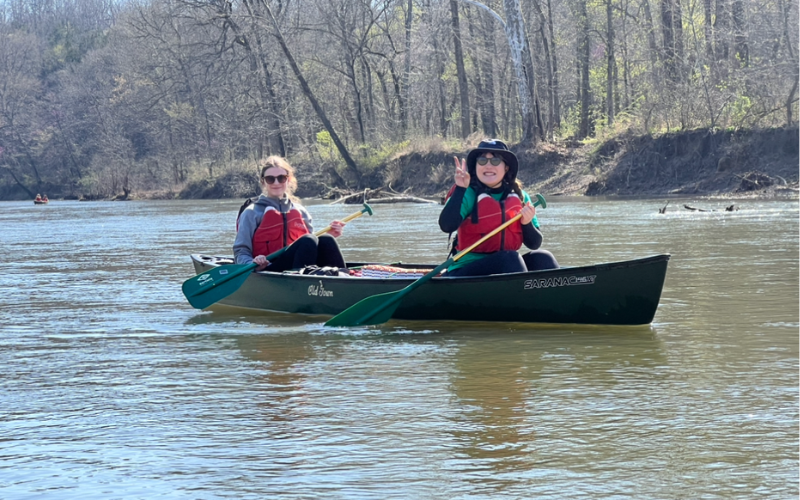 two students in canoe