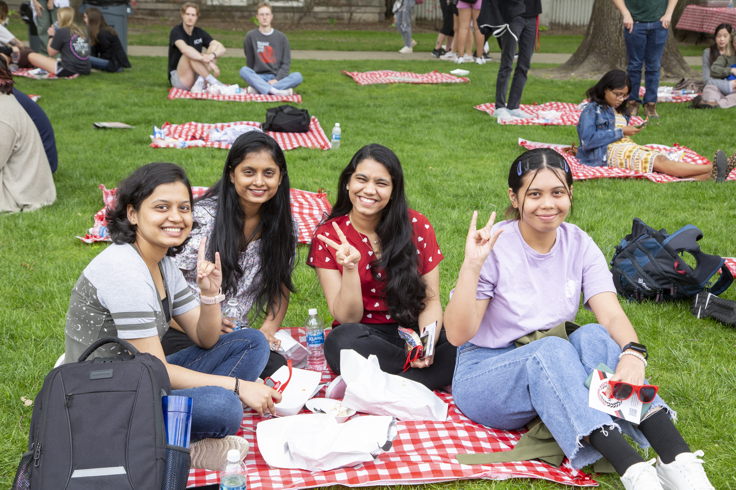 Four students pose for the camera during the picnic.