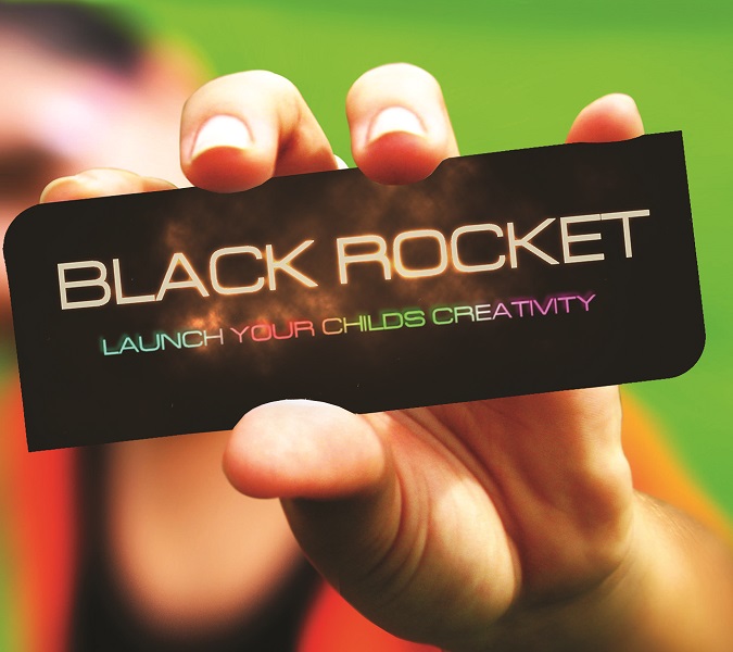 hand-holding-black-rocket-logo-on-card