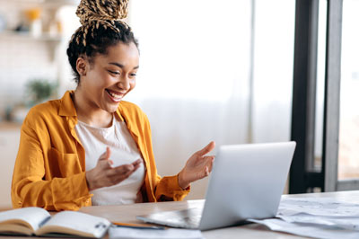 Online student studying at her computer.