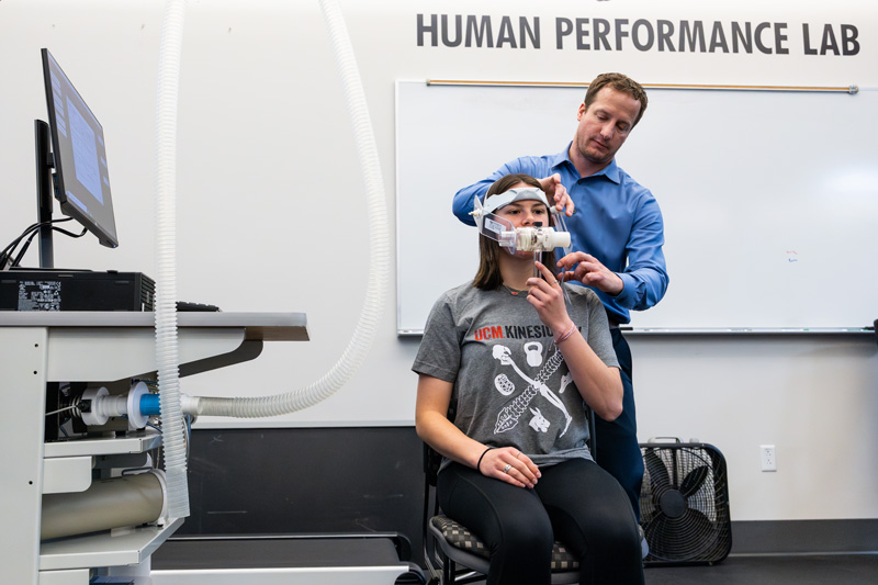 UCM professor and student in Human Performance Lab