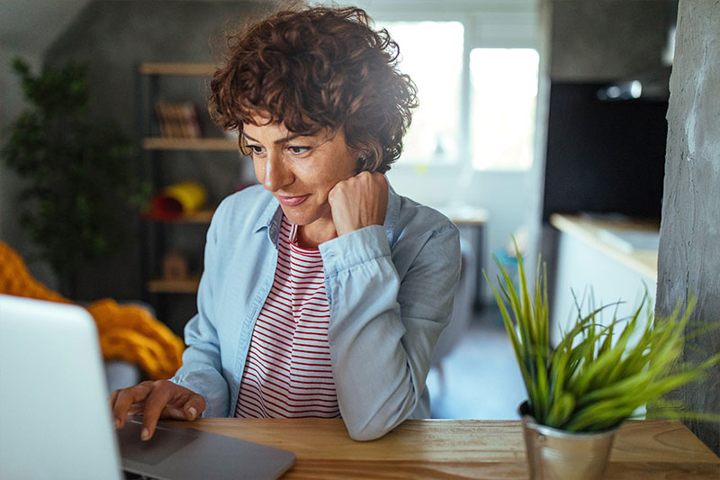 Woman-working-at-home-computer