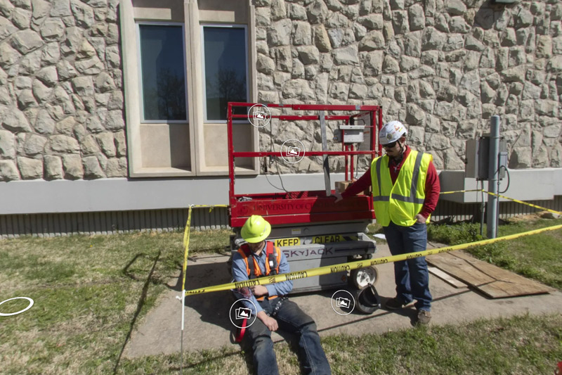 Two students performing a mock safety investigation