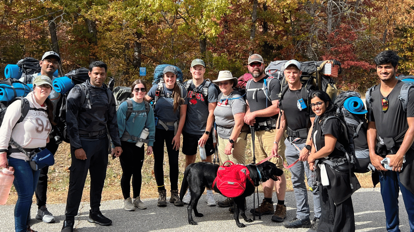 Group of students on backpacking trip in the fall.