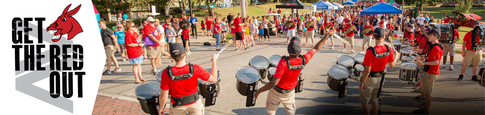 Crowd of people and drummers at Get the Red Out street fair