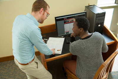 Teacher trainee helping a student