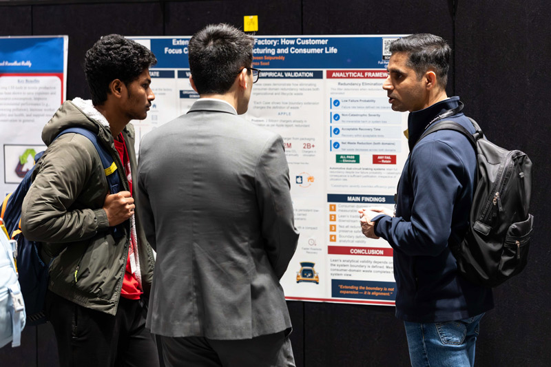 Students viewing presentation posters
