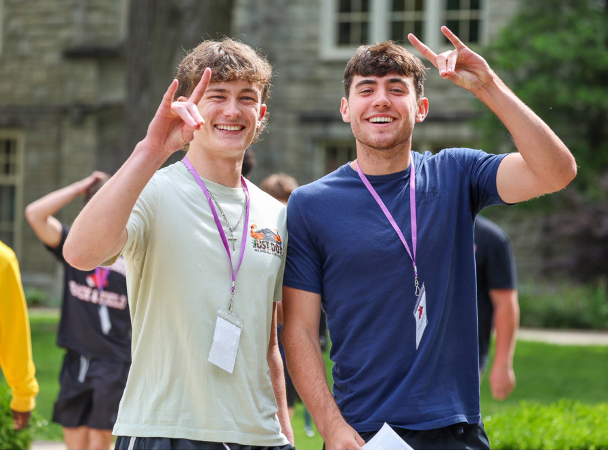 spirited students giving the "snouts out" hand signal
