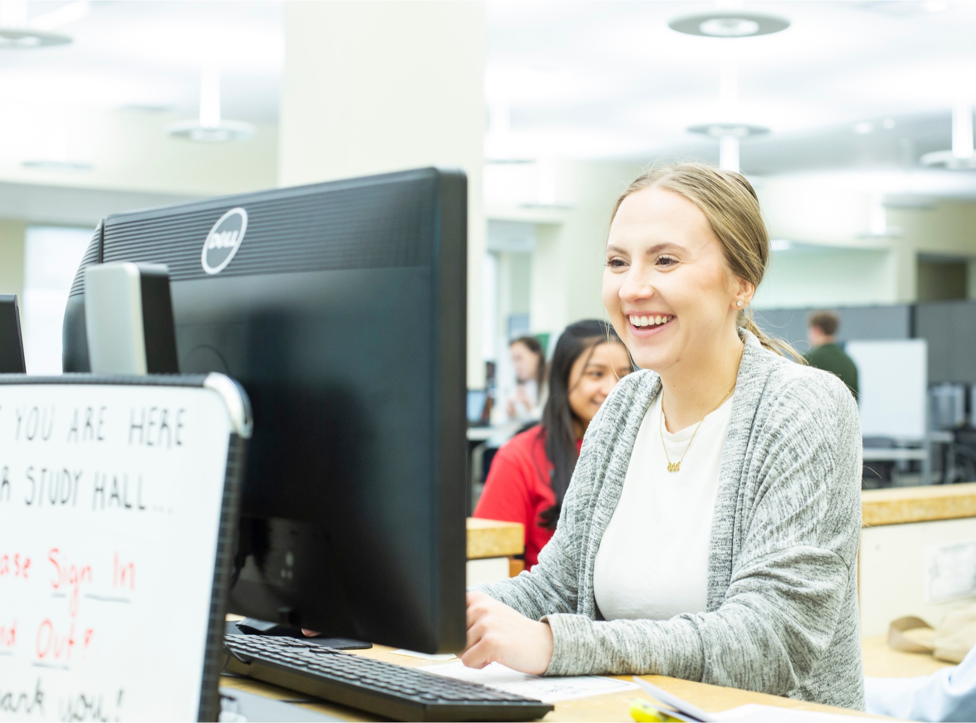 a student asking a question to a UCM staff member