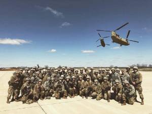 Cadets with helicopters in the background