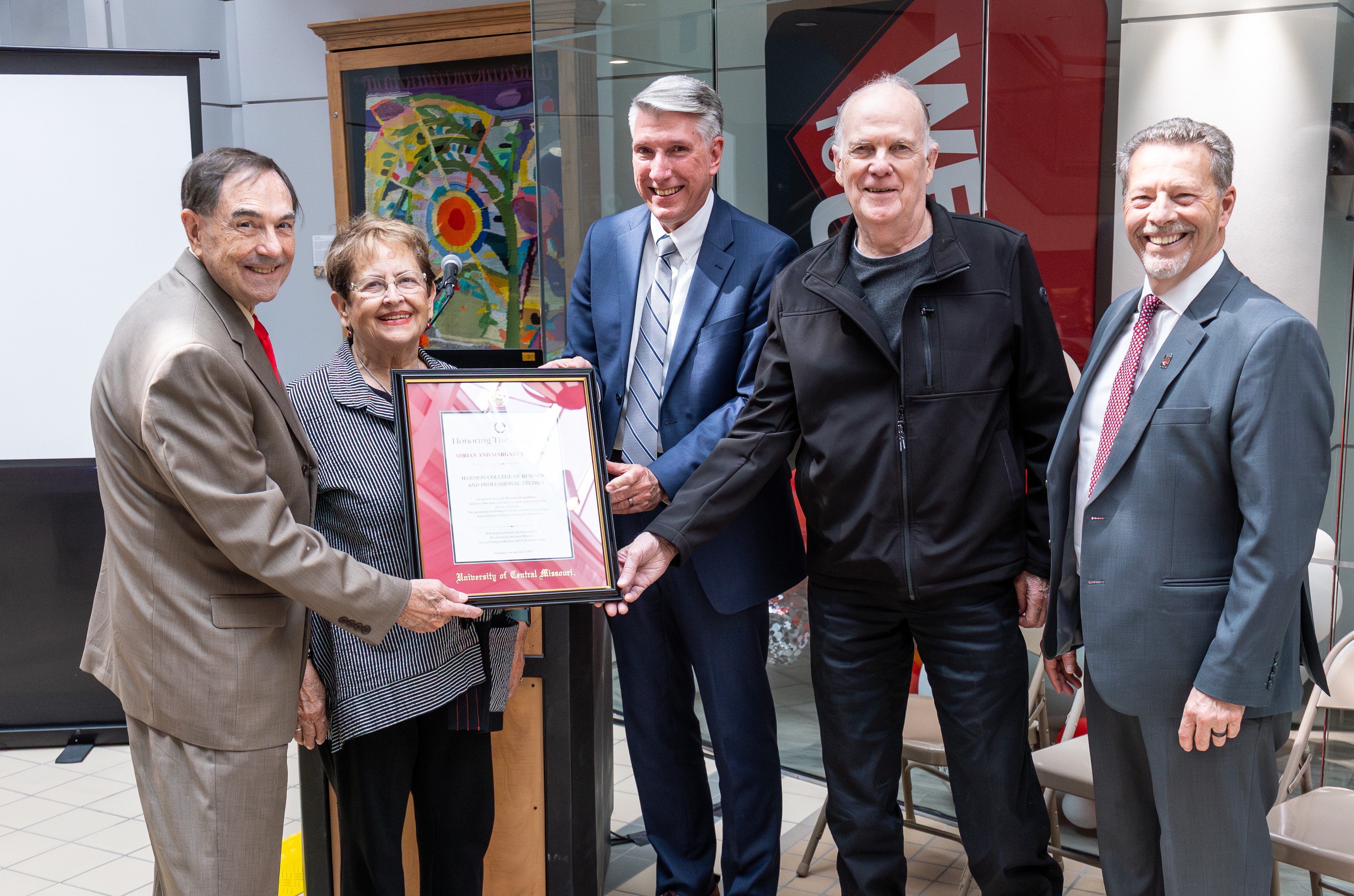 Harmons and UCM Leadership commemorate 30th anniversary.