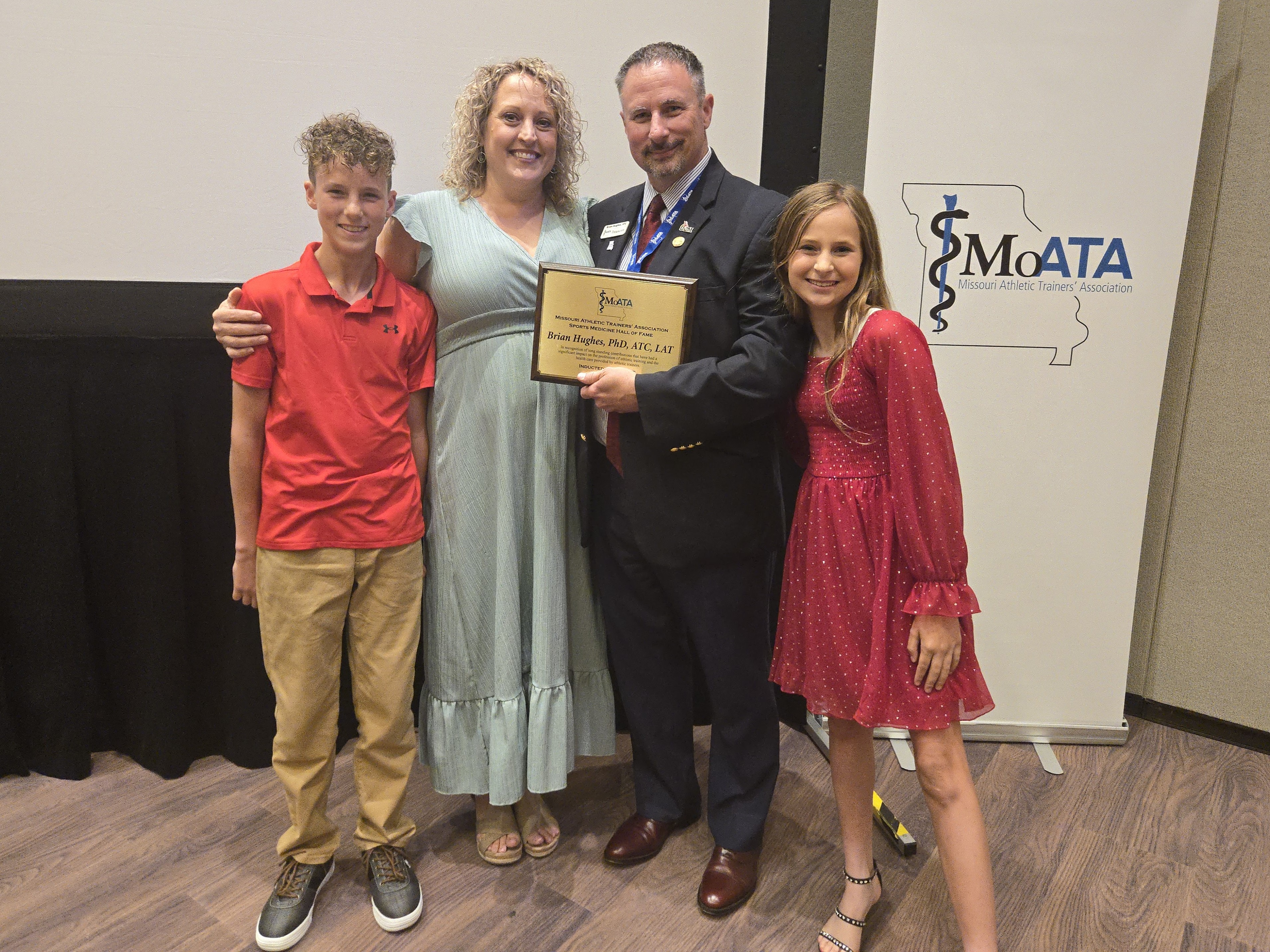 Dr. Brian Hughes and his family