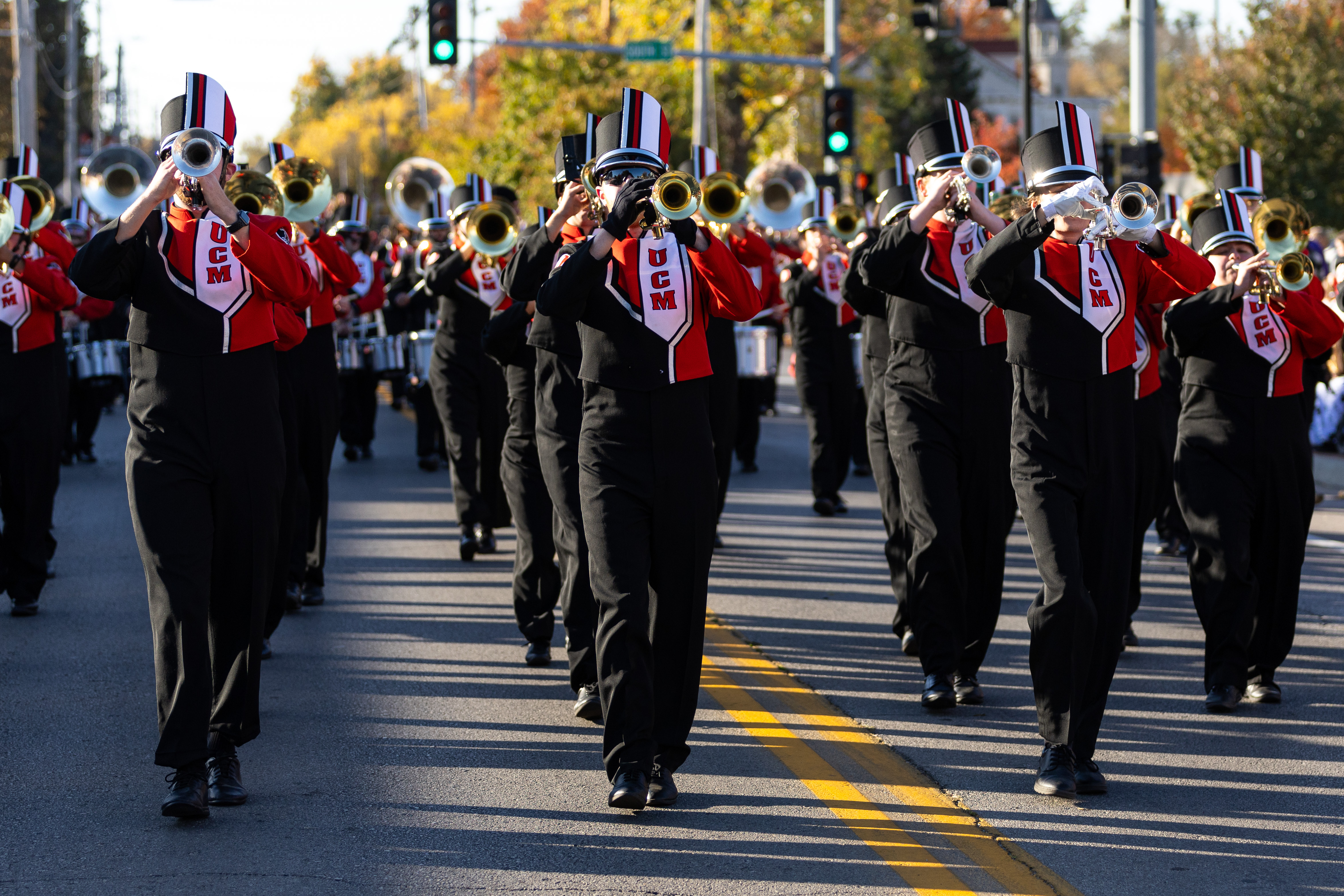 Marching Mules walk in 2024 Homecoming parade