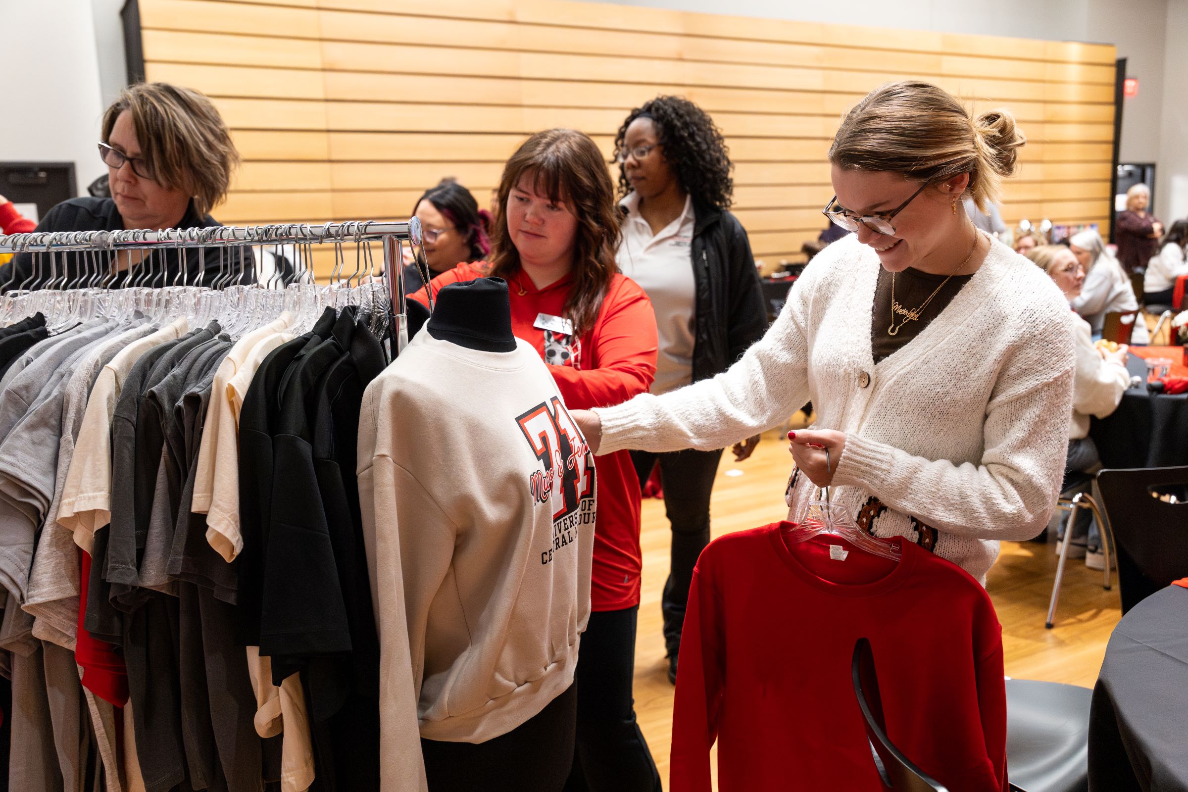 Shoppers browse the UCM Fashion pop-up shop