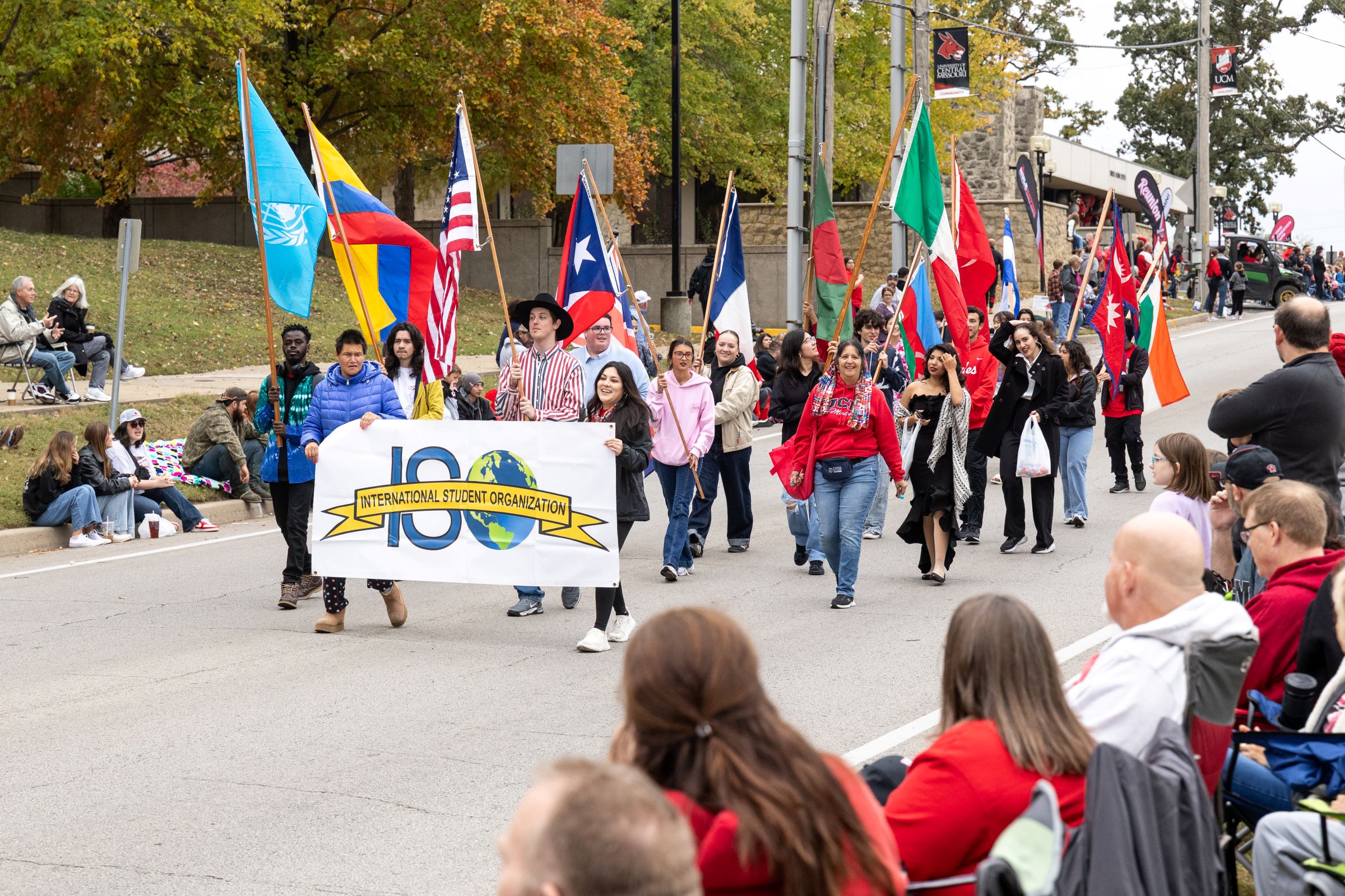 International Student Organization members in the Homecoming parade