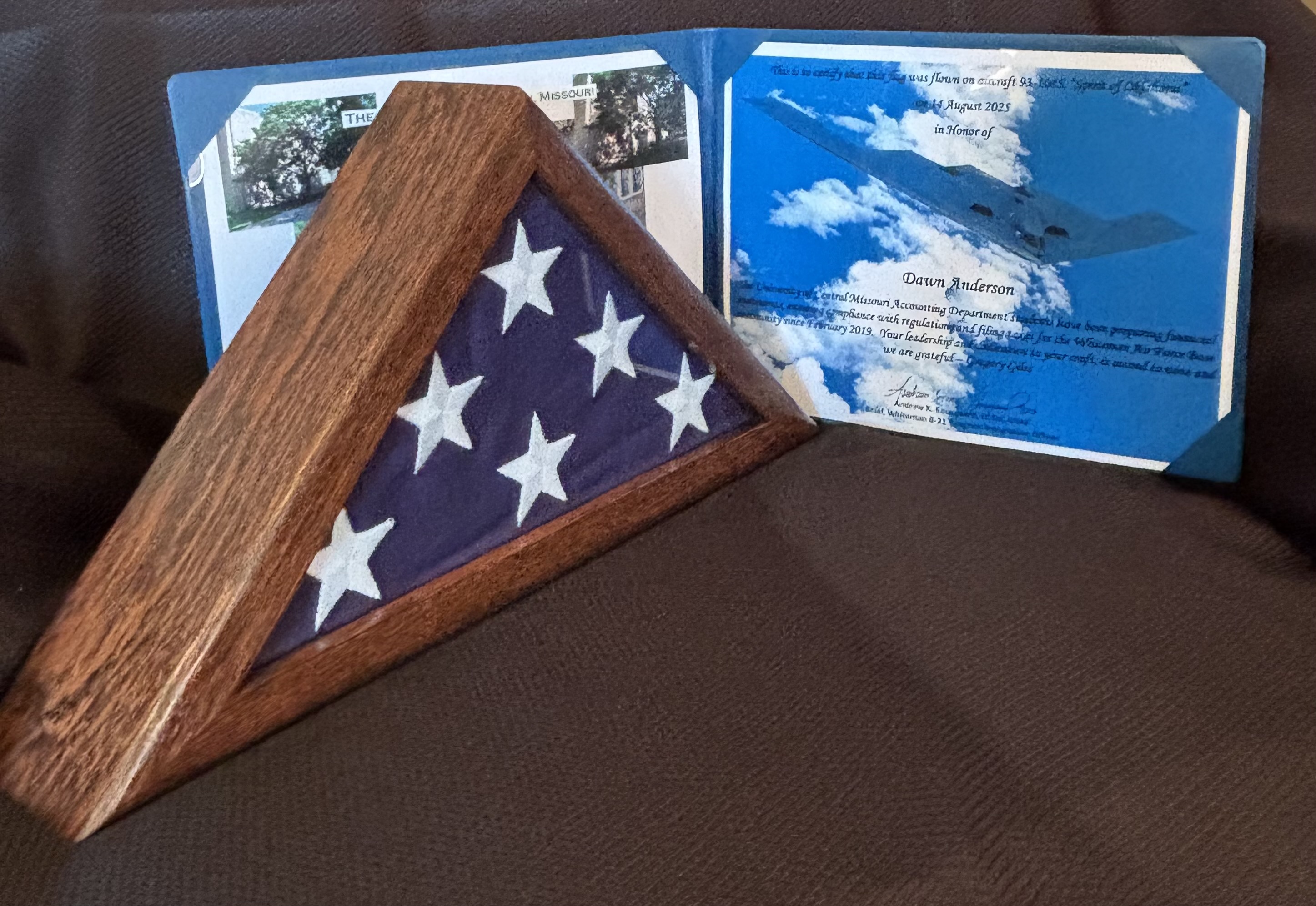 American flag and certificate