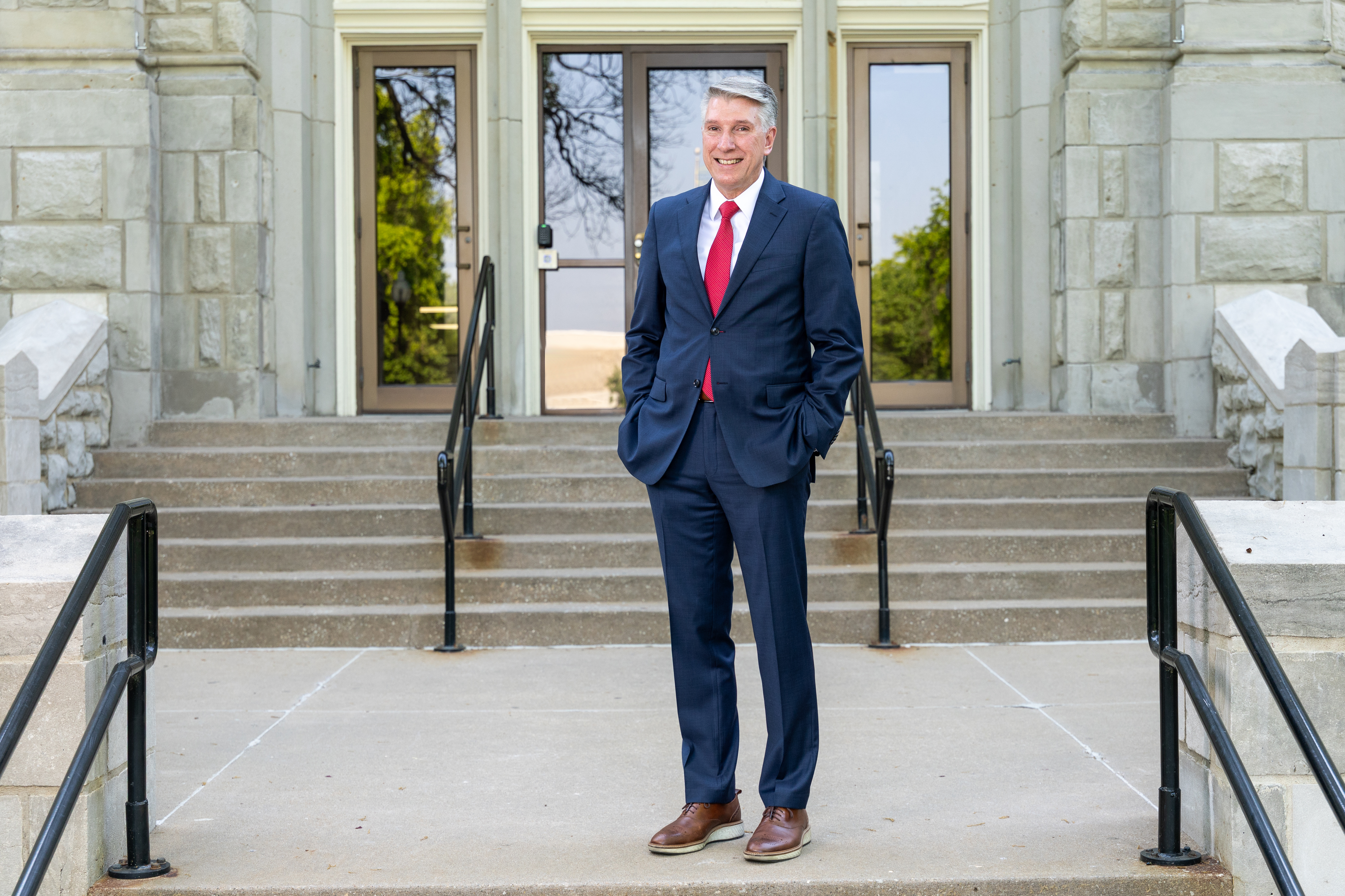 UCM President Roger Best in front of the Administration Building