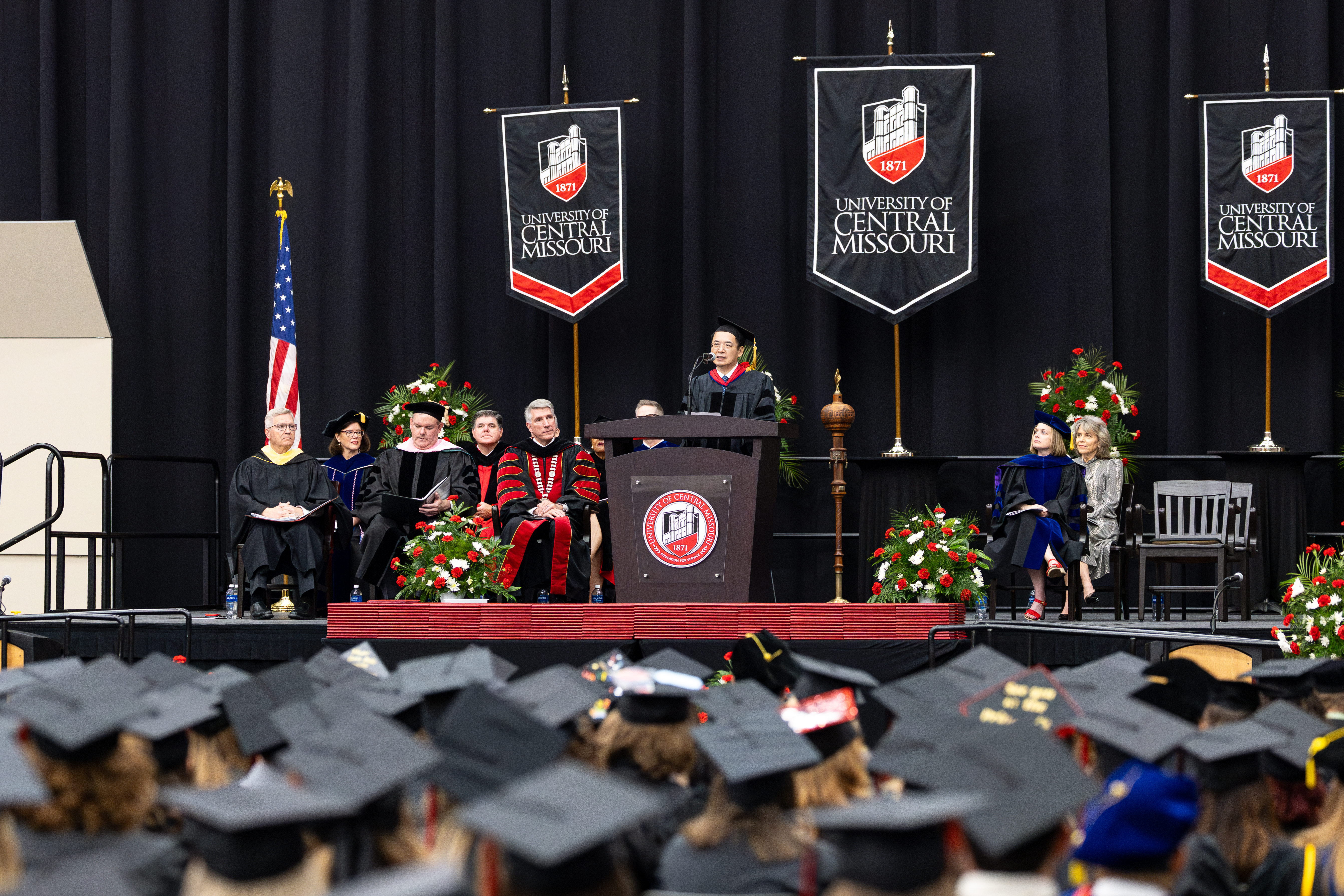 Professor Yuankun Yao speaks during a Spring 2025 Commencement ceremony