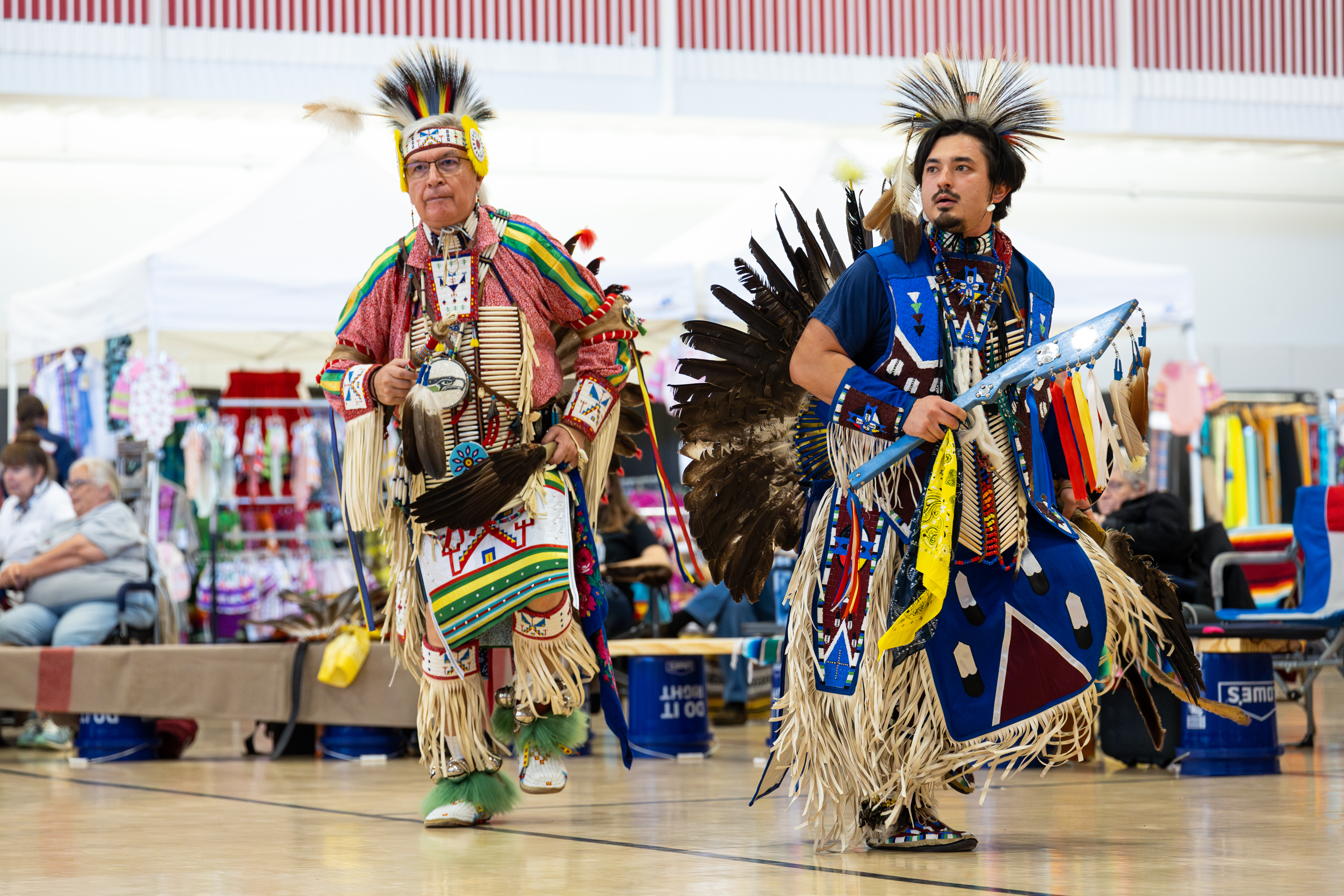 Two men dance during the 2024 Trading Moon Powwow