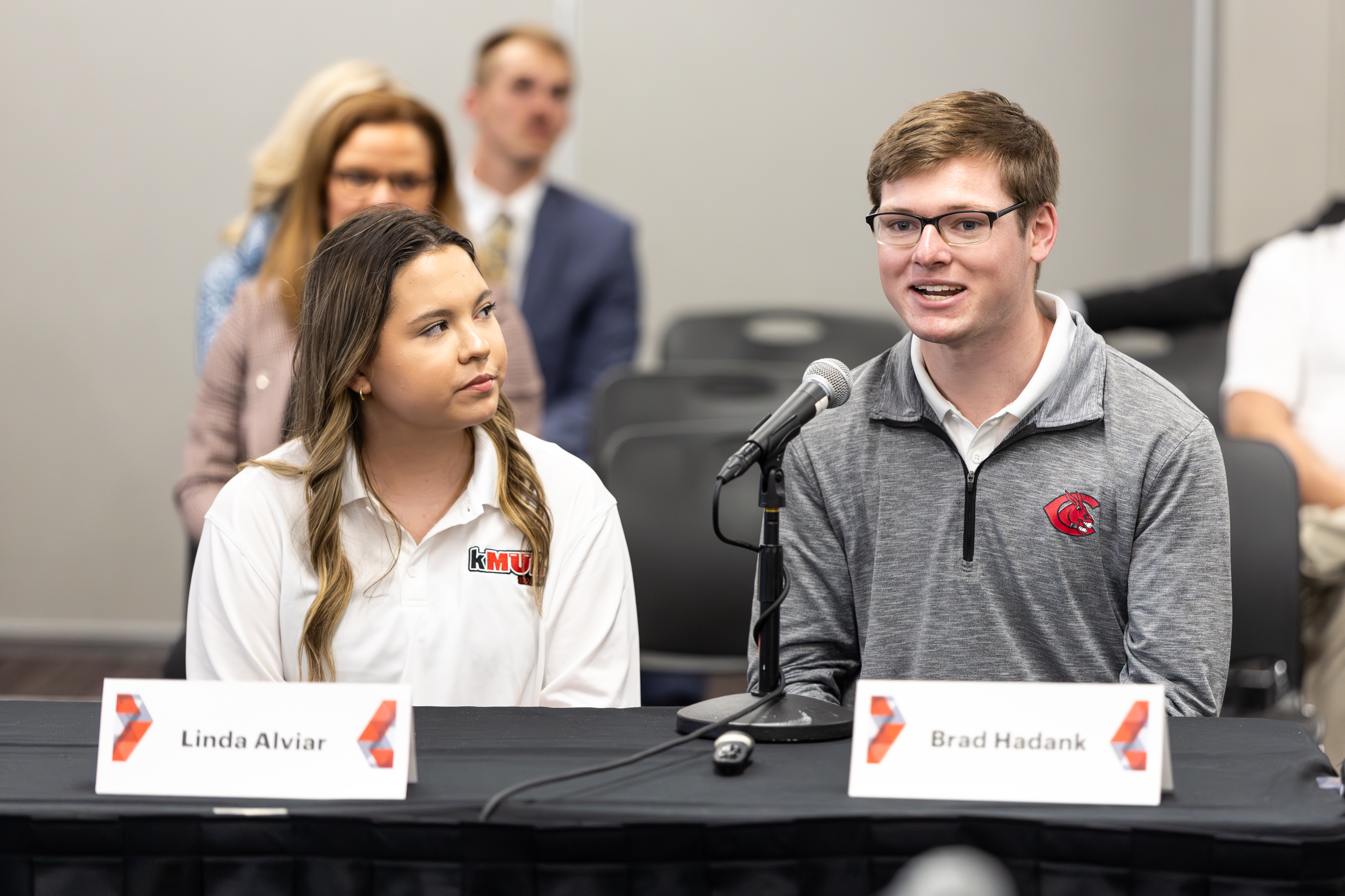 Linda Alviar, left, and Brad Hadank participate in a student panel discussion during the UCM Board of Governors meeting on March 26 in Warrensburg. Hadank serves as KMUL sports director.