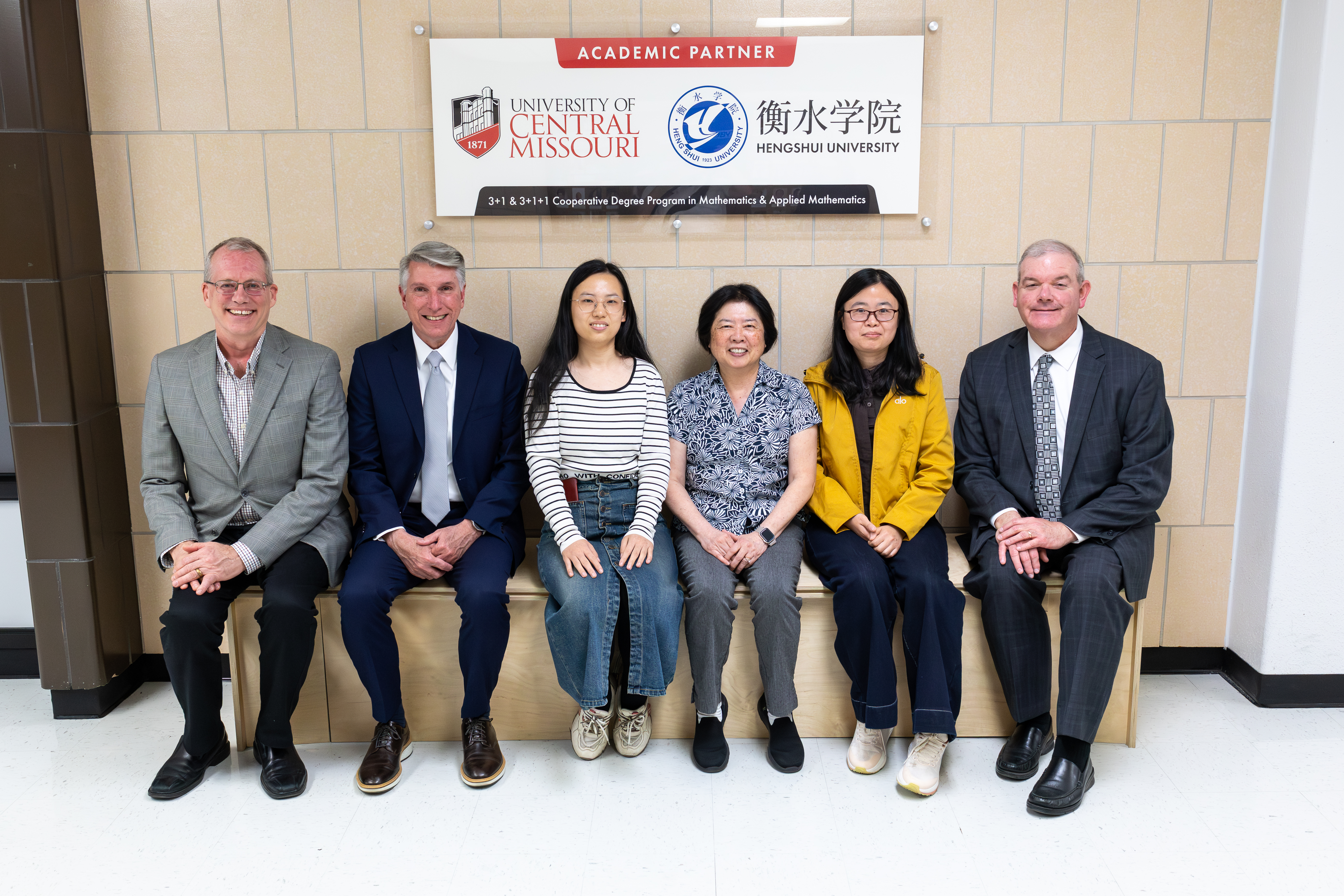 (left to right): Dean Jeff Robertson, President Roger Best, Dr. Na Zhang, Dr. Phoebe McLaughlin, Dr. Junzi Yang, Ms. Valerie Heming, Provost Tim Crowley.