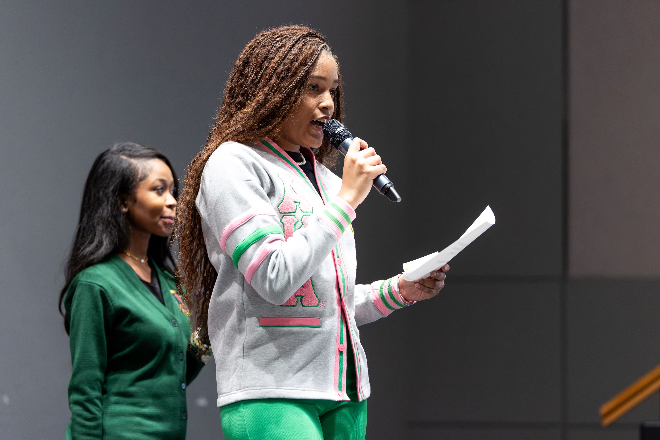 A UCM student speaks during the call and response