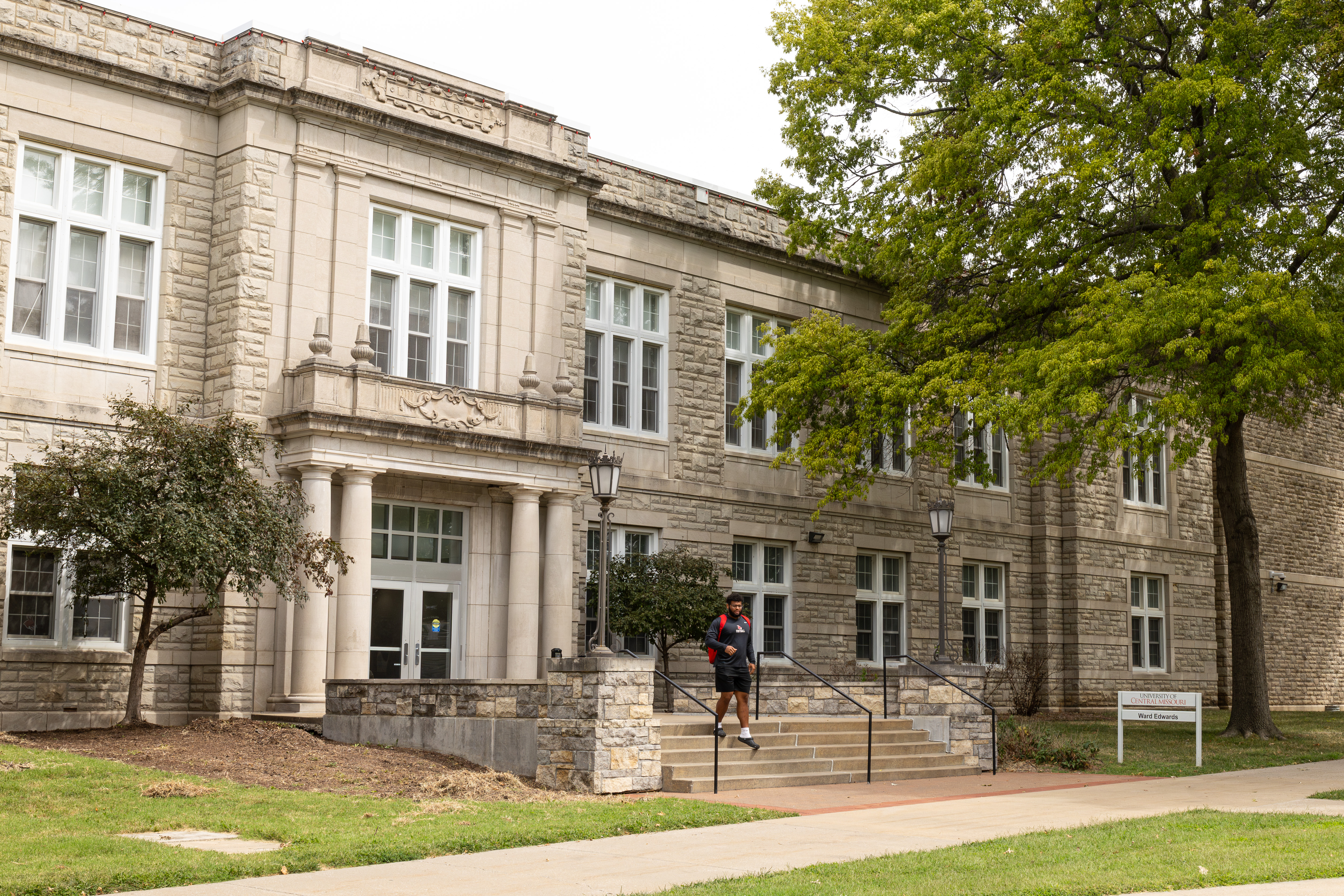 Student walks out of the Ward Edwards Building