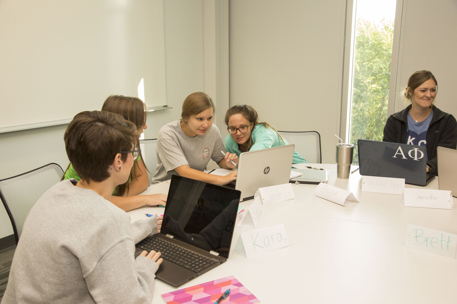 Students around table at UCM.