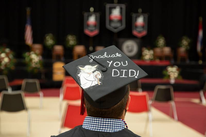 graduate-with-colorful-mortarboard