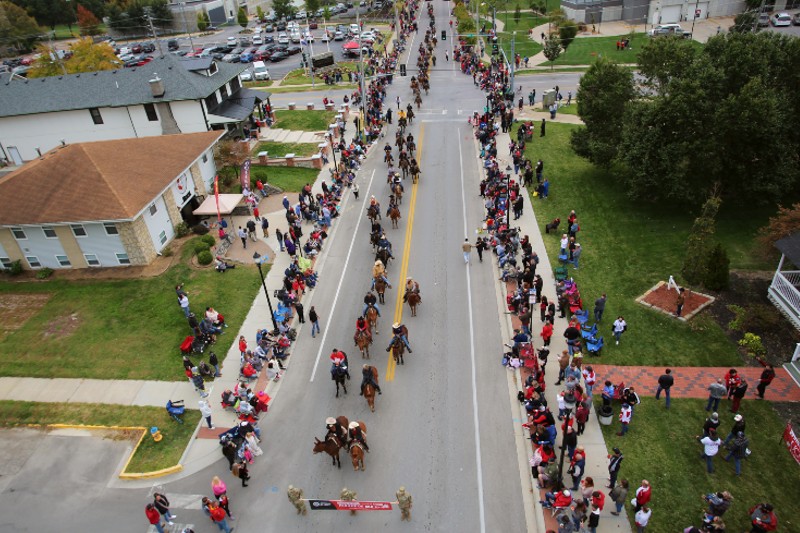 parade of mules and riders