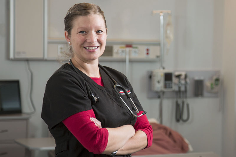 photo of nursing student in red and black