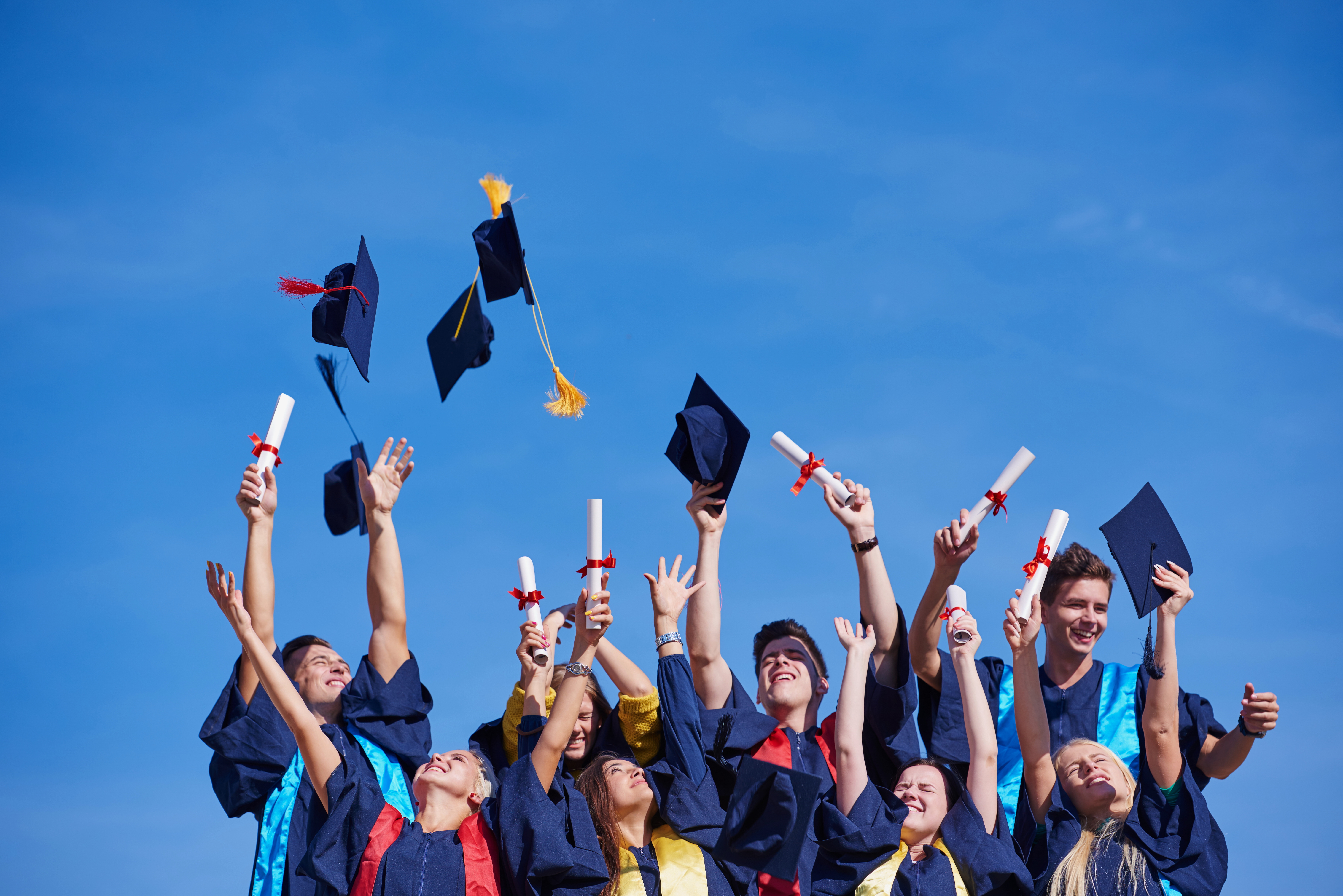 graduates celebrating