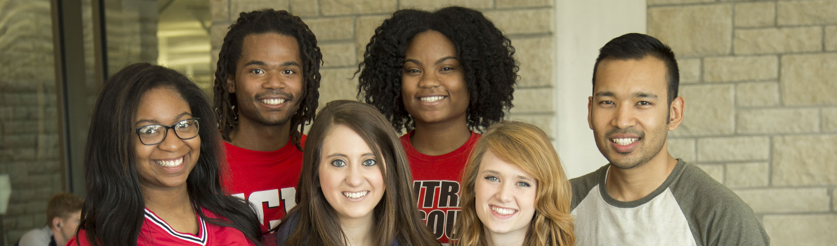 Six UCM students smiling for camera