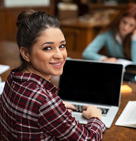 A student using a laptop