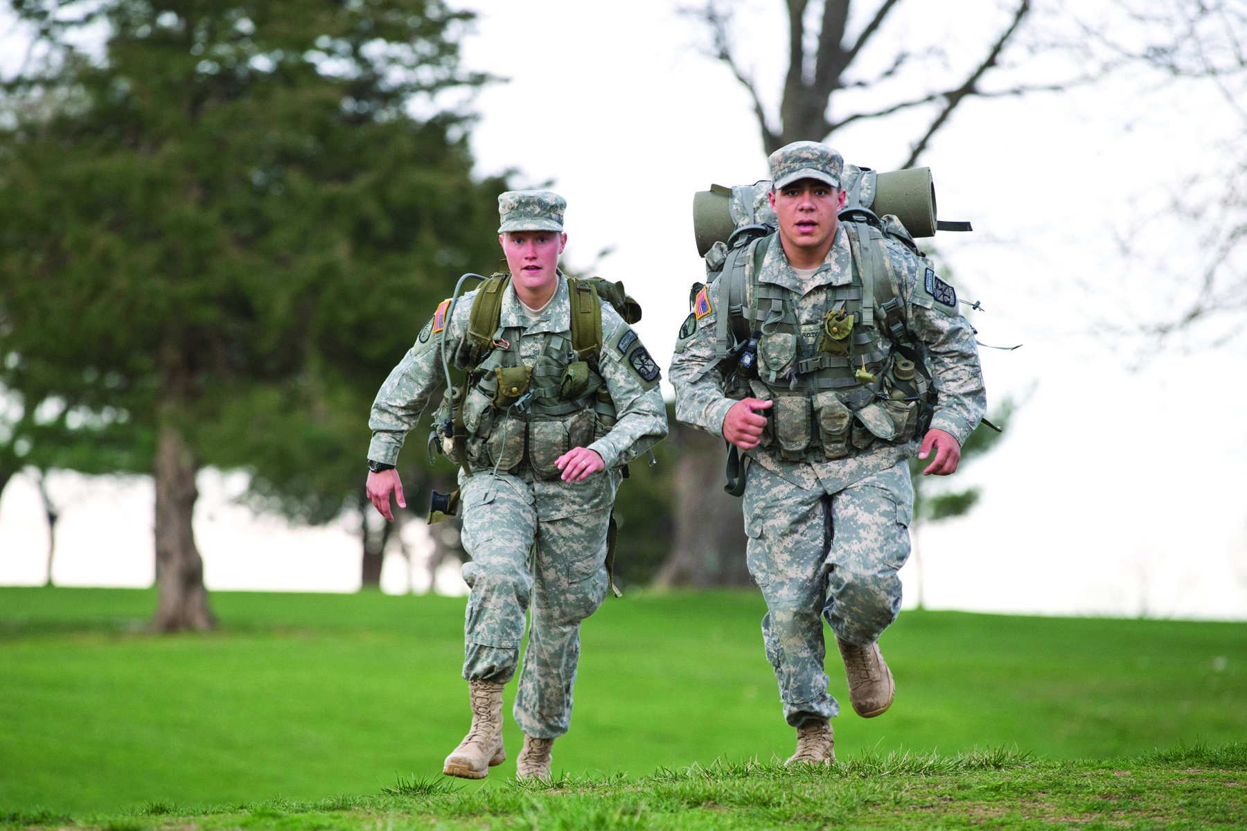 ROTC students jogging in full gear