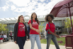 three students walking outside of Student Rec and Wellness Center