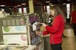 female student getting soft serve ice cream