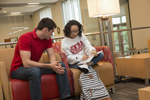 two students working together in Student Recreation and Wellness Center