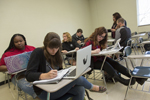 students sitting at desks in classroom