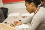 female student working at desk