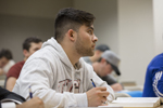 close up of male student in classroom