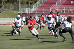 UCM Mules football team playing football