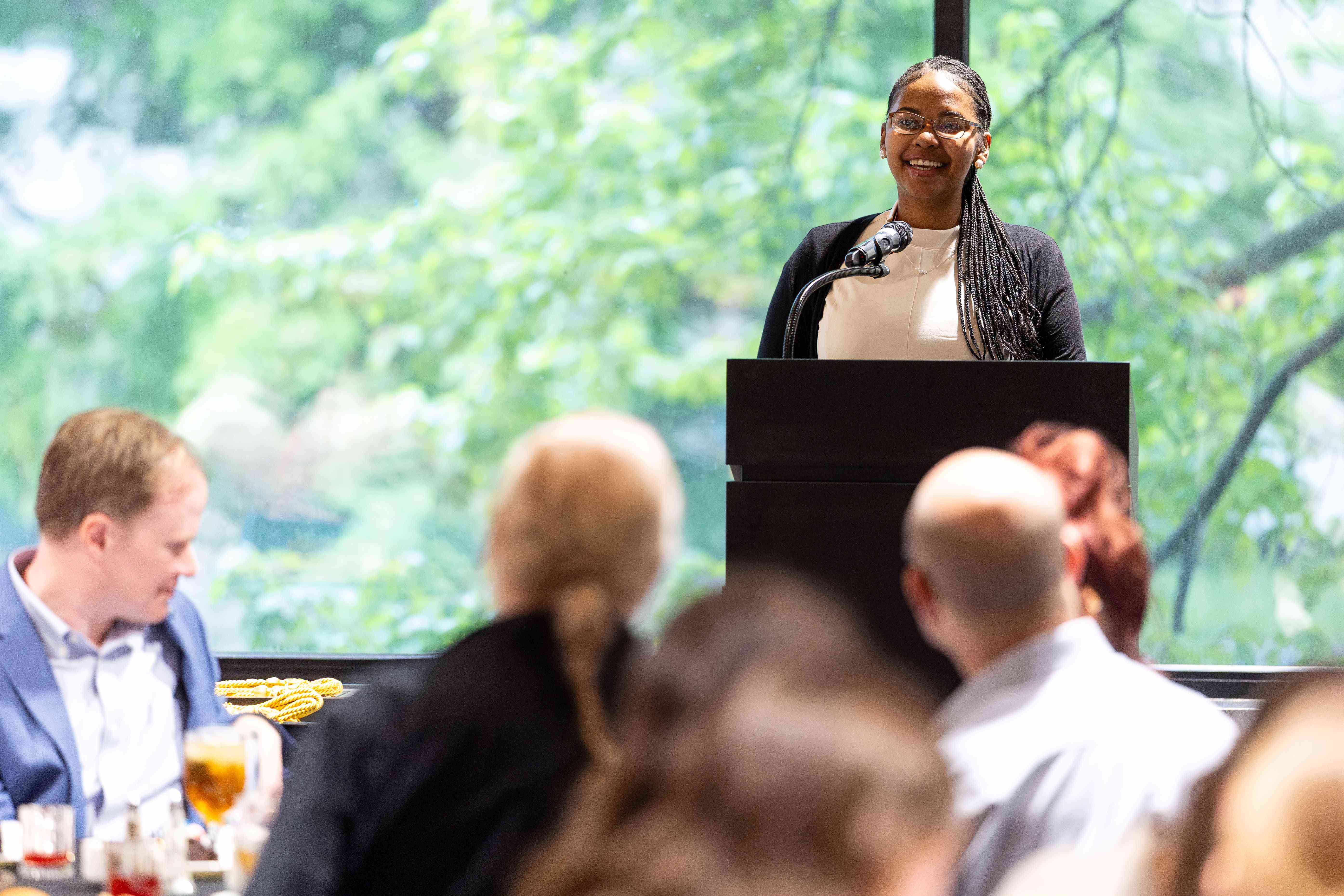 Honors student presenting at the Honors College Graduate Dinner.